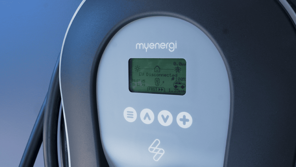 Wall-mounted smart EV charger installed for residential electric vehicle charging