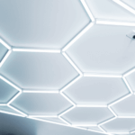 Hexagon LED ceiling lighting installed in garage or workshop area