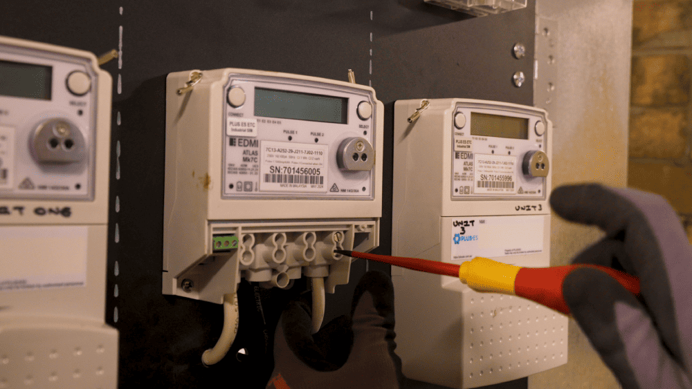 Close-up of electrical meter connection testing