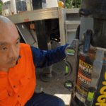 Electrician preparing footing area for private power pole installation